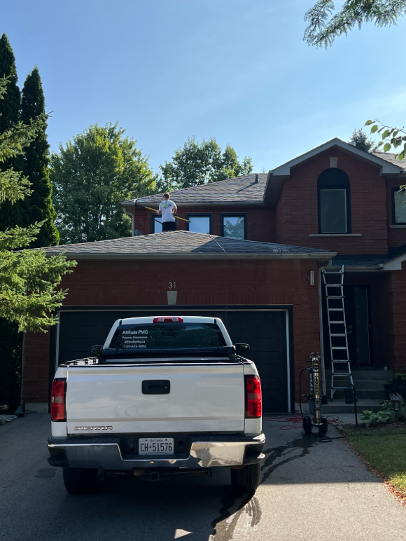 Altitude Property Maintenance Group completing exterior cleaning at a local home