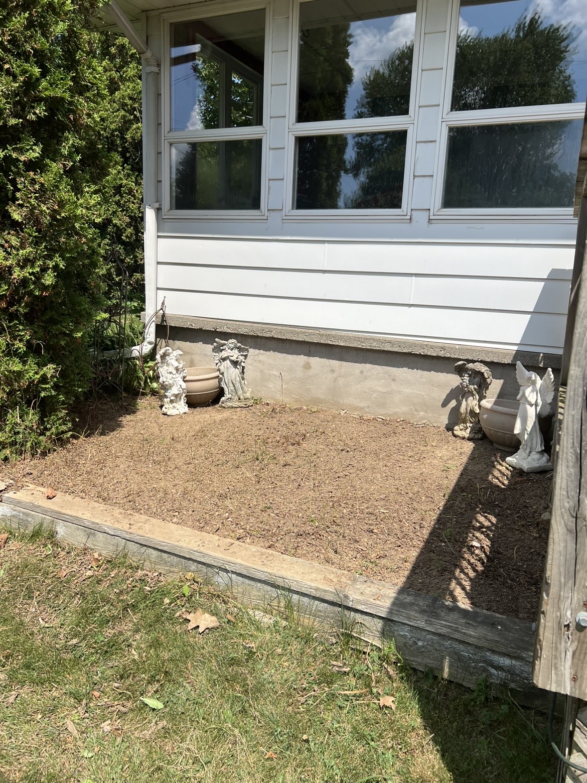 Cleaned-up garden bed after weed removal and tidy